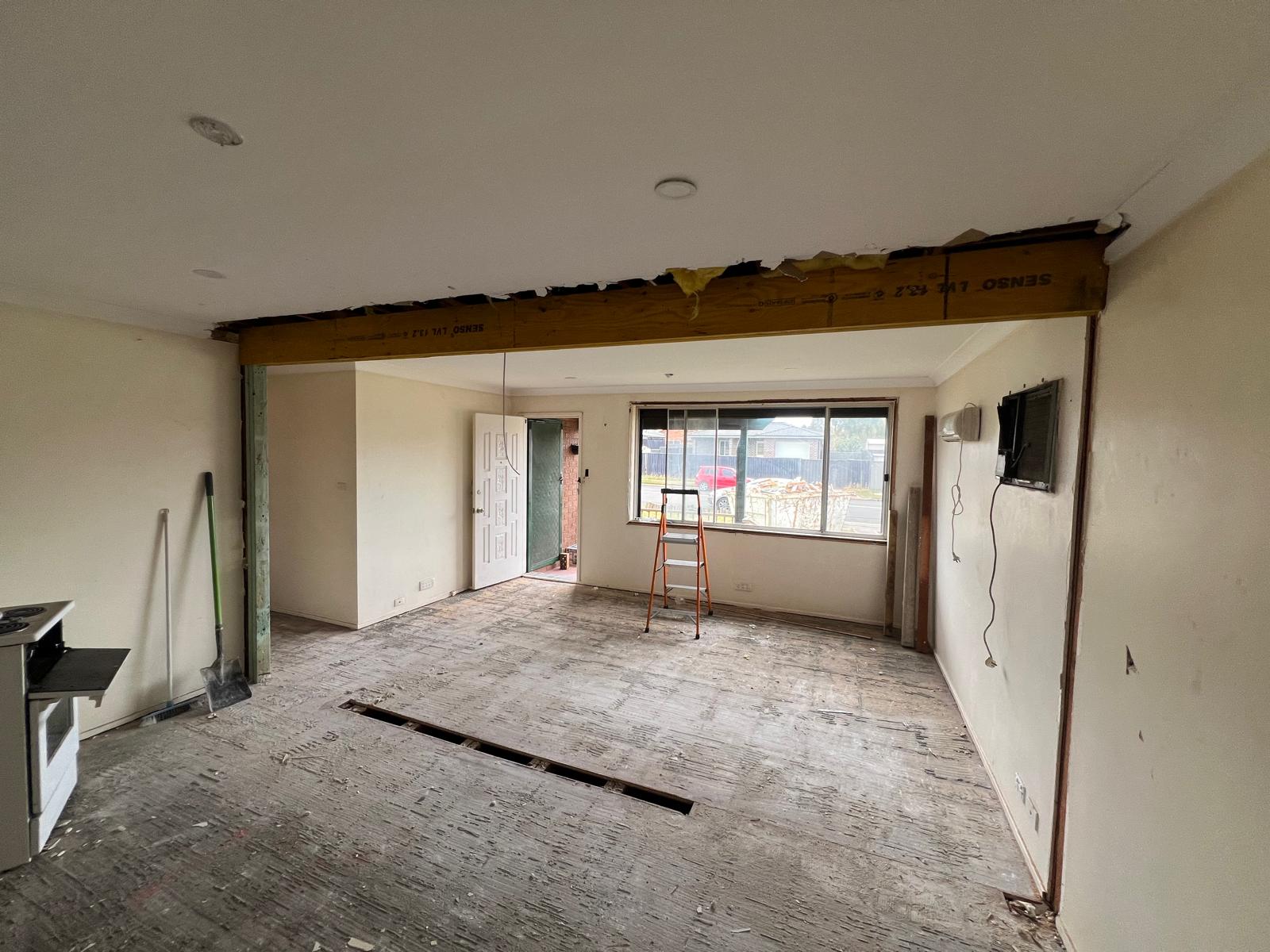 Cleared lounge ready for new build stage